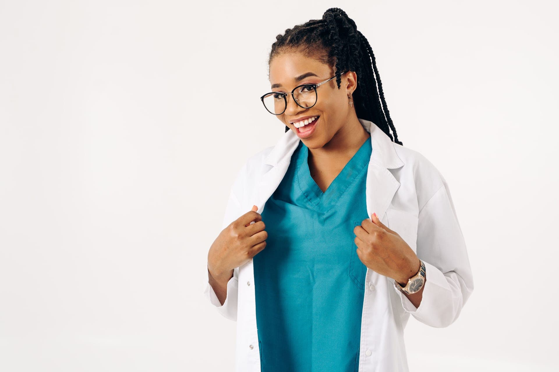 A gray v-neck scrub top with utility pockets