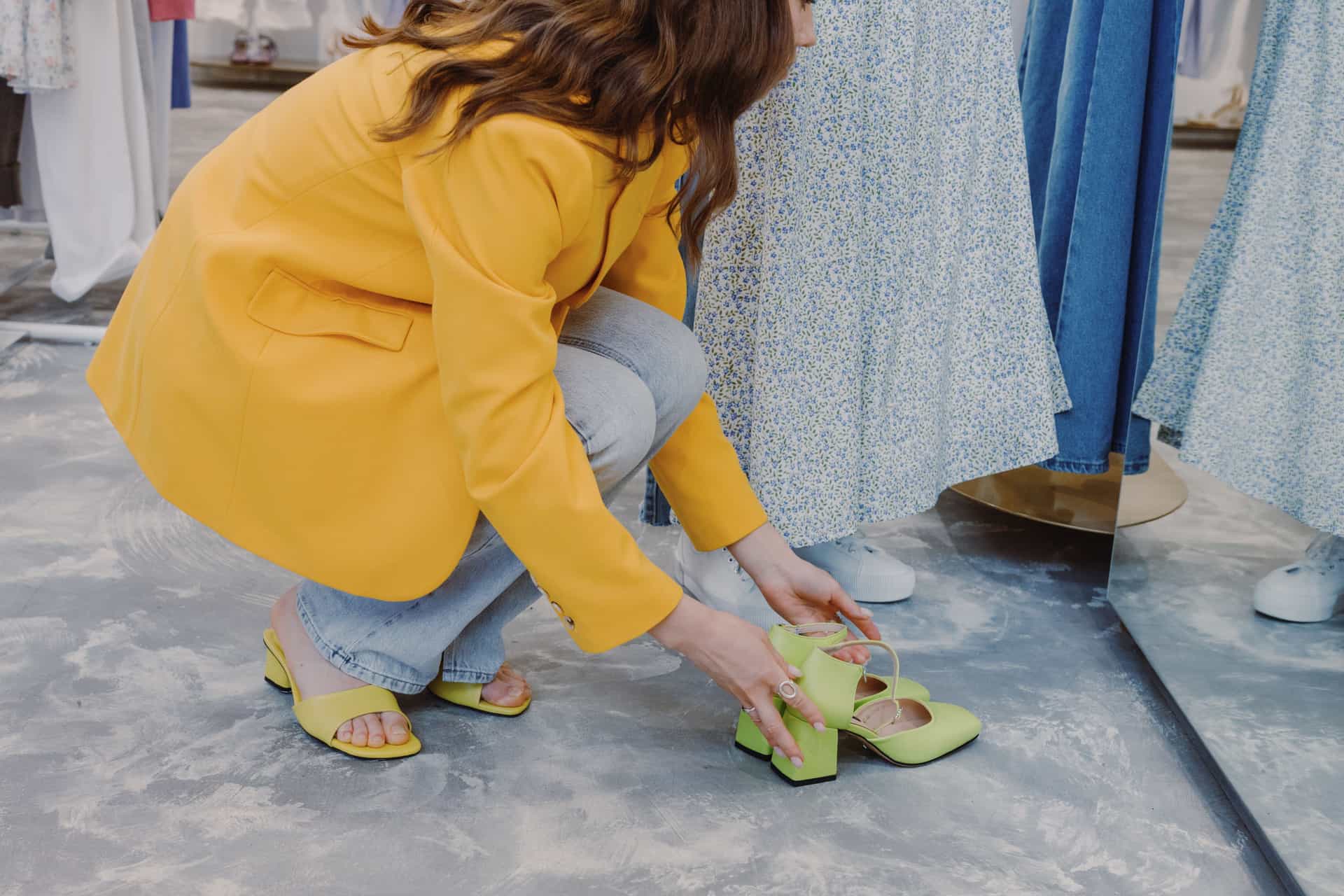Trying shoes on in a shop